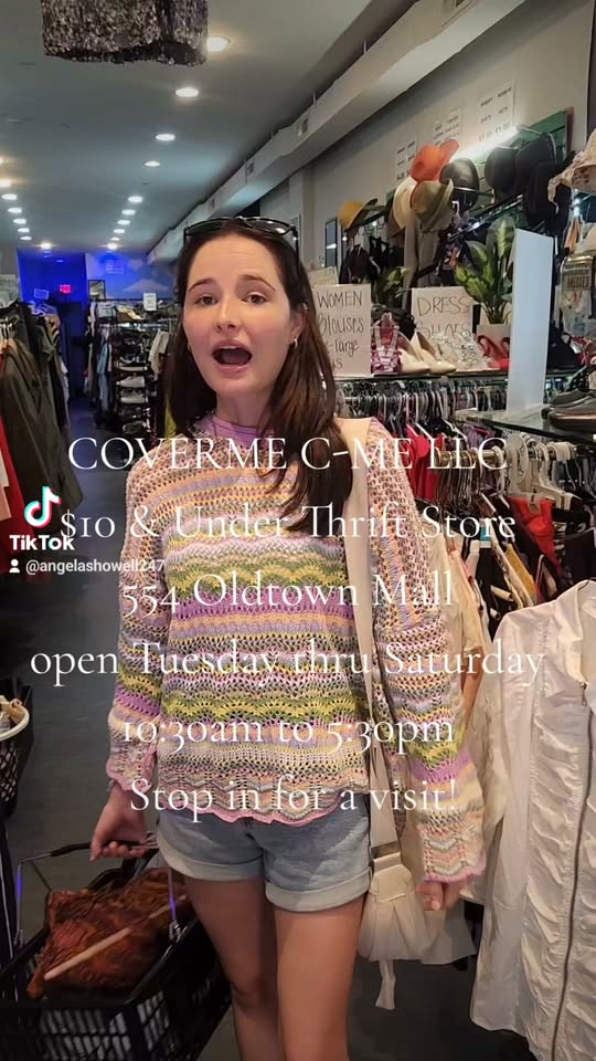 A shopper recording a vertical video inside COVERME C-ME